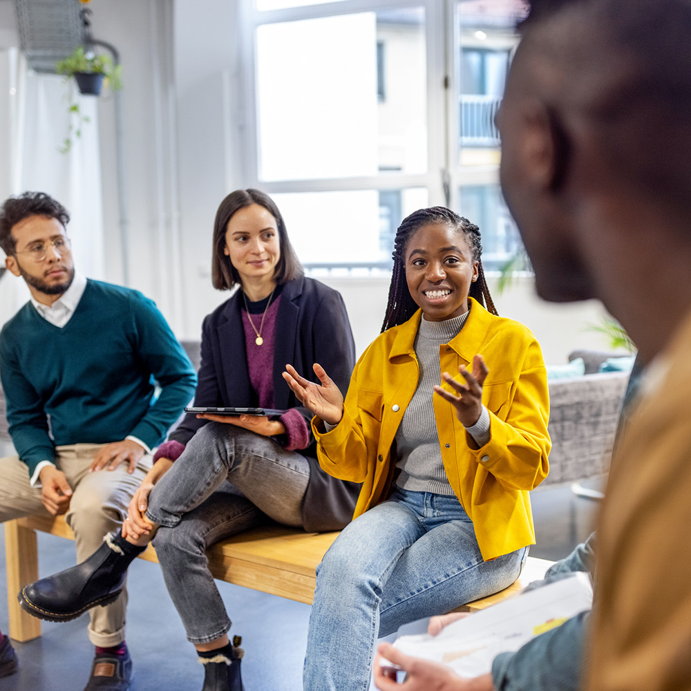 Diverse group of students discussing their business management and administration learning